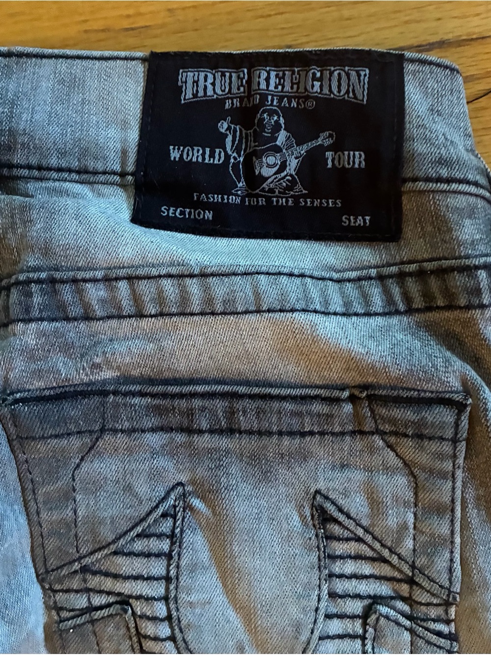 True Religion Men's Light Blue Denim Jeans - Classic Back Pocket Design